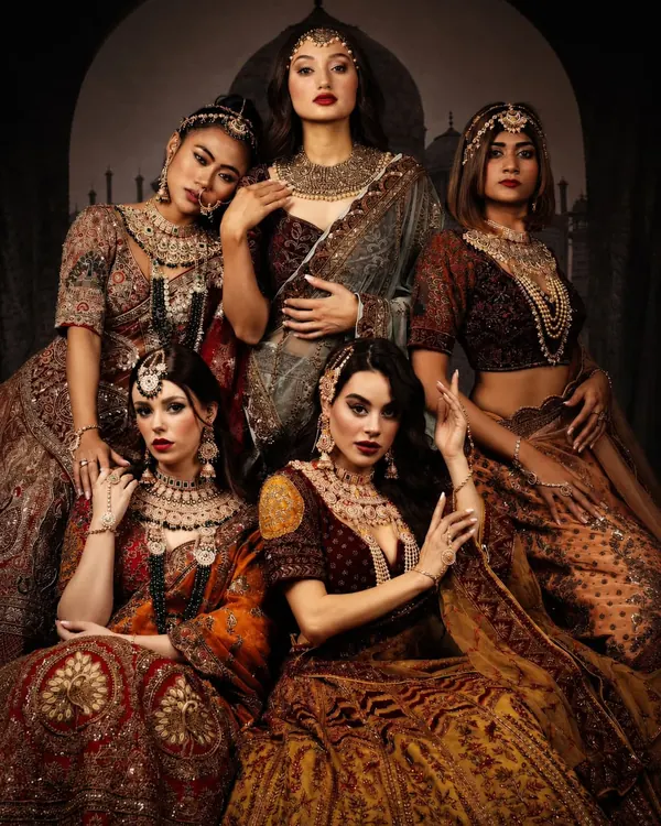 Models in bridal couture on a fashion campaign shoot